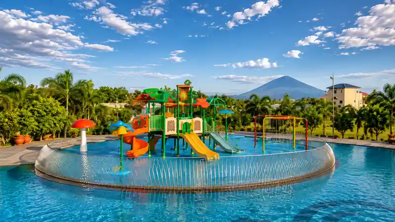 Kavanagh Resort pool and water play area with a mountain view