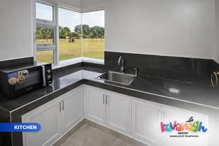 Kitchen inside Kavanagh Resort villa